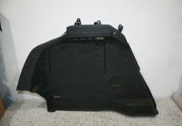 Обшивка багажника левая нижняя для Opel Astra H с 2004 г (13255723) в наличии на складе